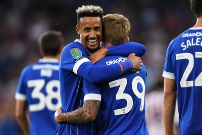 260825 - Cardiff City v Cheltenham Town - Carabao Cup Round Two - Isaak Davies of Cardiff City celebrates scoring a goal Callum Robinson of Cardiff City