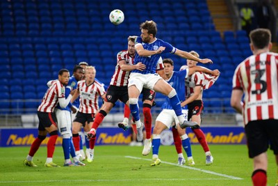 260825 - Cardiff City v Cheltenham Town - Carabao Cup Round Two - Calum Chambers of Cardiff City heads to score his sides second goal
