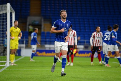 260825 - Cardiff City v Cheltenham Town - Carabao Cup Round Two - Calum Chambers of Cardiff City celebrates scoring a goal