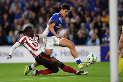 260825 - Cardiff City v Cheltenham Town - Carabao Cup Round Two - Rubin Colwill of Cardiff City has a shot on goal saved  by Joe Day of Cheltenham Town