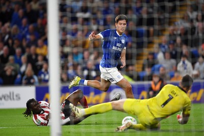 260825 - Cardiff City v Cheltenham Town - Carabao Cup Round Two - Rubin Colwill of Cardiff City has a shot on goal saved  by Joe Day of Cheltenham Town