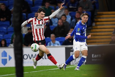 260825 - Cardiff City v Cheltenham Town - Carabao Cup Round Two - Cian Ashford of Cardiff City puts a cross into the box