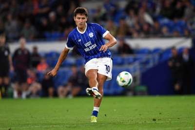 260825 - Cardiff City v Cheltenham Town - Carabao Cup Round Two - Rubin Colwill of Cardiff City hits the free kick