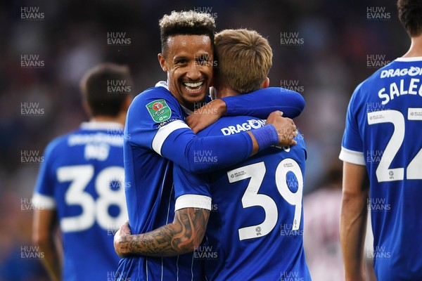 260825 - Cardiff City v Cheltenham Town - Carabao Cup Round Two - Isaak Davies of Cardiff City celebrates scoring a goal Callum Robinson of Cardiff City