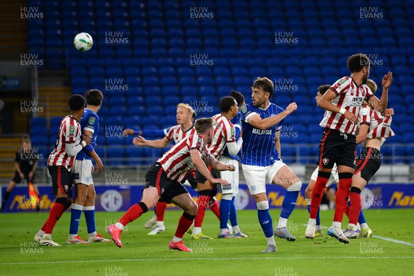 260825 - Cardiff City v Cheltenham Town - Carabao Cup Round Two - Calum Chambers of Cardiff City heads to score his sides second goal