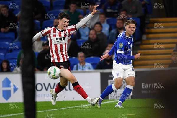 260825 - Cardiff City v Cheltenham Town - Carabao Cup Round Two - Cian Ashford of Cardiff City puts a cross into the box