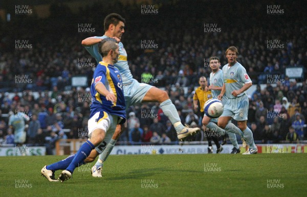 08.12.07 - Cardiff City v Colchester United, Coca Cola Championship -  Colchester's John Jackson gets past Cardiff's Kevin McNaughton to fire home and score goal 