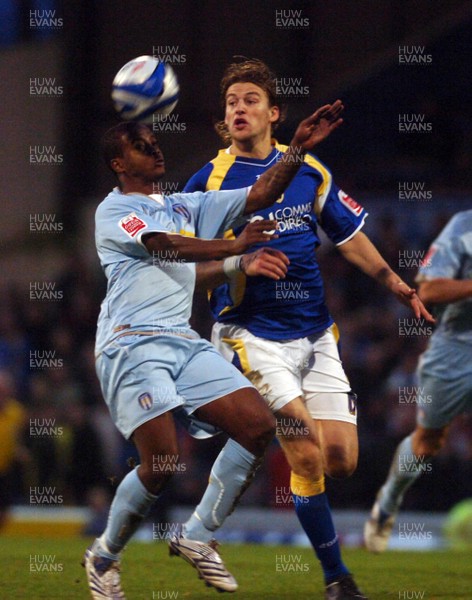 08.12.07 - Championship Football Cardiff City v Colchester United Colchester's Kevin Lisbie is challenged by Cardiff's Glenn Loovens 