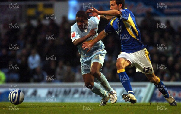 08.12.07 - Championship Football Cardiff City v Colchester United Colchester's Kevin Lisbie is challenges by Cardiff's Roger Johnson 