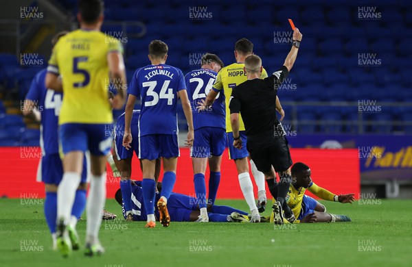 090823 - Cardiff City v Colchester United, EFL Carabao Cup - Samson Tovide of Colchester United is shown a red card