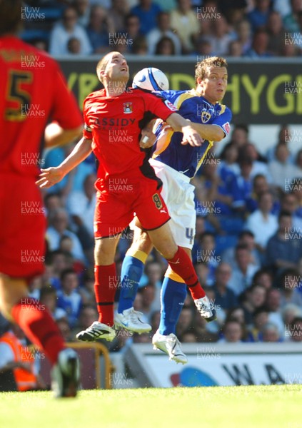 25.08.07 - Championship Football Cardiff City v Coventry City Coventry's Michael Doyle and Cardiff's Gavin Rae go for a high ball 