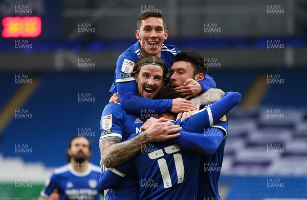 130221 - Cardiff City v Coventry City, Sky Bet Championship - Kieffer Moore of Cardiff City, right,  celebrates with Aden Flint of Cardiff City and Josh Murphy of Cardiff City and Harry Wilson of Cardiff City after he scores the second goal