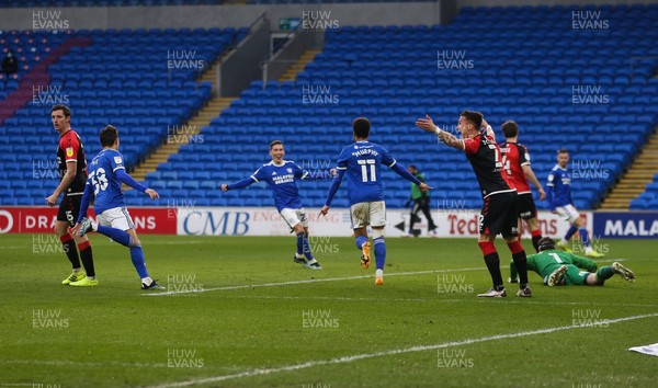 130221 - Cardiff City v Coventry City, Sky Bet Championship - Josh Murphy of Cardiff City wheels away to celebrate with Harry Wilson of Cardiff City after he score the third goal