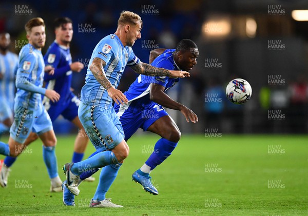 190923 - Cardiff City v Coventry City - EFL SkyBet Championship - Yakou Meite of Cardiff City and Kyle McFadzean of Coventry City compete
