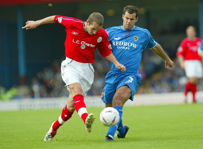 270903Cardiff City v Crewe Alexandra  Cardiff's Chris Baker is tackled by David Wright   Division One