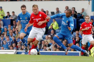 270903 Cardiff City v Crewe Alexandra Crewe's Dean Ashston gets challenged by Daniel Gabbidon 