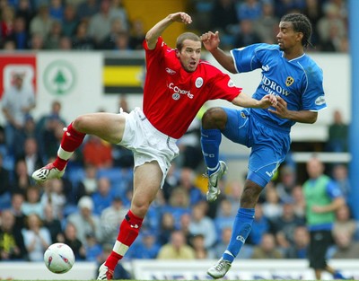 270903Cardiff City v Crewe Alexandra  Crewe's David Wright denies Richard Langley a shot at goal 