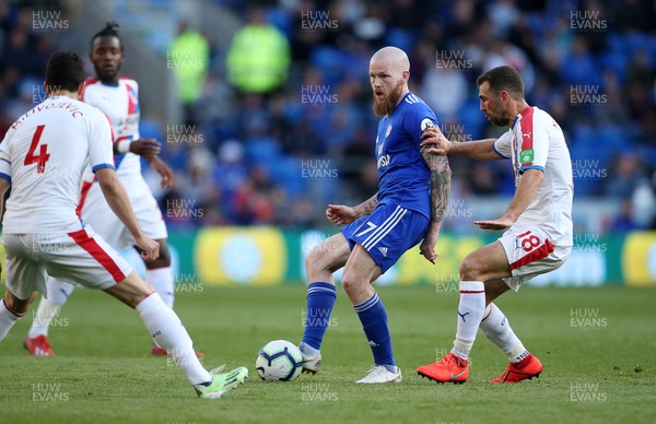 040519 - Cardiff City v Crystal Palace - Premier League - Aron Gunnarsson of Cardiff City is challenged by James McArthur of Crystal Palace
