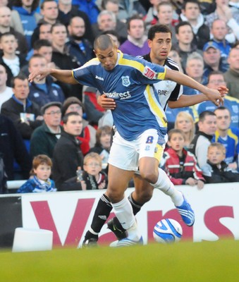 08.04.09 - Championship Football Cardiff City v Derby County Cardiff's Jay Bothroyd is challenged by Derby's Lewin Nyatanga 