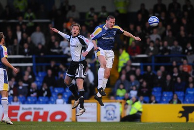08.04.09 - Championship Football Cardiff City v Derby County Derby's Rob Hulse and Cardiff's Gabor Gyepes go for a high ball 