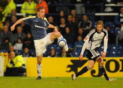 08.04.09 - Championship Football Cardiff City v Derby County Cardiff's Gabor Gyepes keeps control as Derby's Rob Hulse challenges 