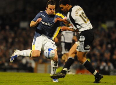 08.04.09 - Championship Football Cardiff City v Derby County Cardiff's Gavin Rae tries to get past Derby's Lewin Nyatanga 