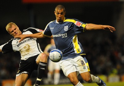 08.04.09 - Championship Football Cardiff City v Derby County Cardiff's Jay Bothroyd is challenged by Derby's James McEveley 