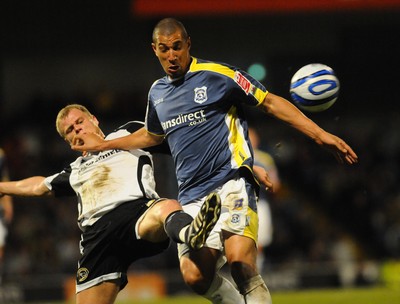 08.04.09 - Championship Football Cardiff City v Derby County Cardiff's Jay Bothroyd is challenged by Derby's James McEveley 