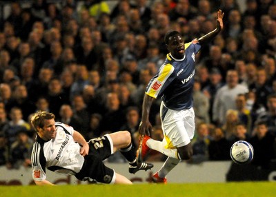 08.04.09 - Championship Football Cardiff City v Derby County Cardiff's Eddie Johnson beats Derby's Andy Todd on his way to score his sides fourth goal 