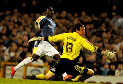 08.04.09 - Championship Football Cardiff City v Derby County Cardiff's Eddie Johnson beats Derby 'keeper Stephen Bywater to score his sides fourth goal 
