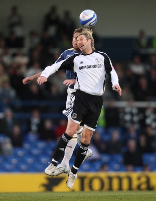 08.04.09.. Cardiff City v Derby County, Coca Cola Championship. -   Cardiff's Stephen McPhail and Derby's Robbie Savage look to win the ball 