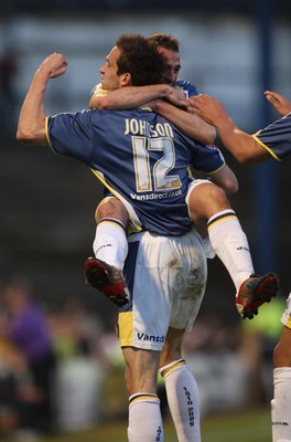 08.04.09.. Cardiff City v Derby County, Coca Cola Championship. -   Cardiff's  Roger Johnson celebrates his goal with Michael Chopra 