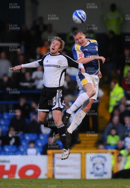 08.04.09 - Championship Football Cardiff City v Derby County Derby's Rob Hulse and Cardiff's Gabor Gyepes go for a high ball 