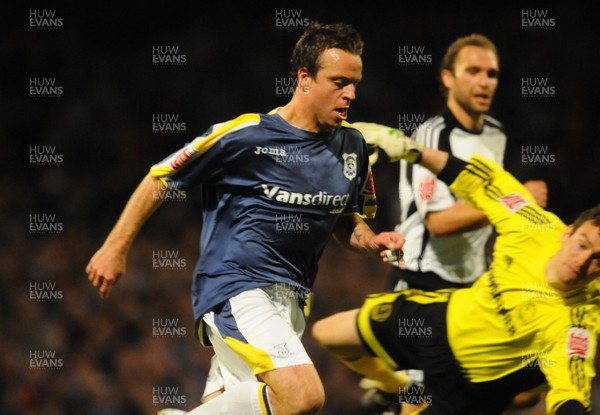 08.04.09 - Championship Football Cardiff City v Derby County Cardiff's Gavin Rae gets past Derby 'keeper Stephen Bywater on his way to score his sides second goal 