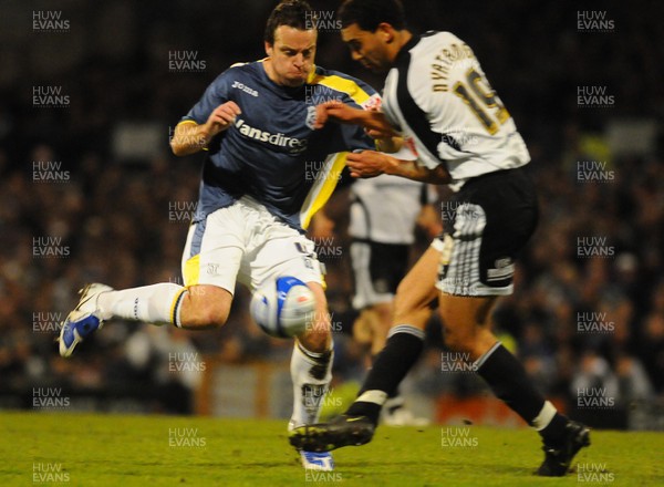 08.04.09 - Championship Football Cardiff City v Derby County Cardiff's Gavin Rae tries to get past Derby's Lewin Nyatanga 