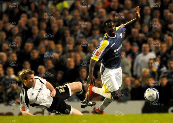 08.04.09 - Championship Football Cardiff City v Derby County Cardiff's Eddie Johnson beats Derby's Andy Todd on his way to score his sides fourth goal 