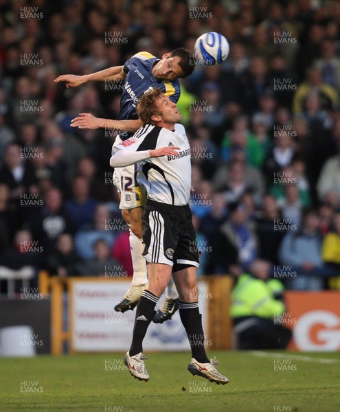 08.04.09.. Cardiff City v Derby County, Coca Cola Championship. -   Cardiff's Roger Johnson gets above Derby's Rob Hulse  