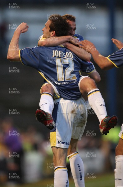 08.04.09.. Cardiff City v Derby County, Coca Cola Championship. -   Cardiff's  Roger Johnson celebrates his goal with Michael Chopra 