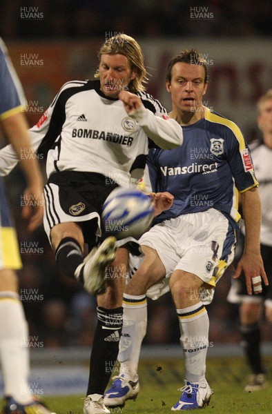 08.04.09.. Cardiff City v Derby County, Coca Cola Championship. -   Derby's Robbie Savage is challenged by Cardiff's Gavin Rae 