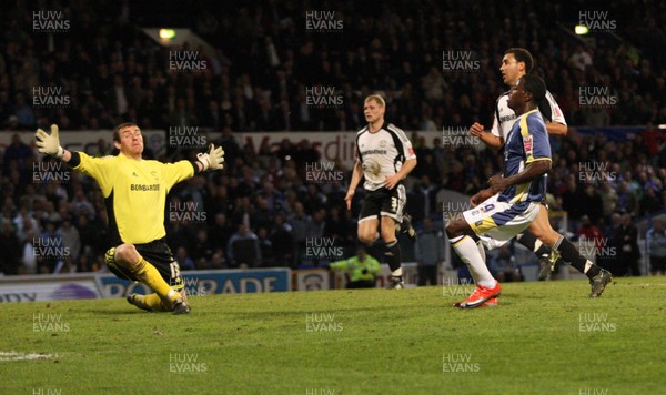 08.04.09.. Cardiff City v Derby County, Coca Cola Championship. -   Cardiff's Eddie Johnson scores City's fourth goal 