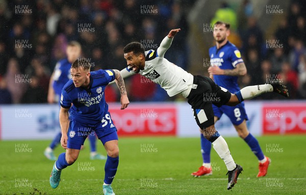010322 - Cardiff City v Derby County, Sky Bet Championship - Nathan Byrne of Derby County and Isaak Davies of Cardiff City compete for the ball