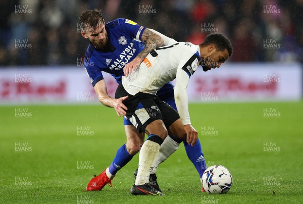 010322 - Cardiff City v Derby County, Sky Bet Championship - Nathan Byrne of Derby County and Joe Ralls of Cardiff City compete for the ball