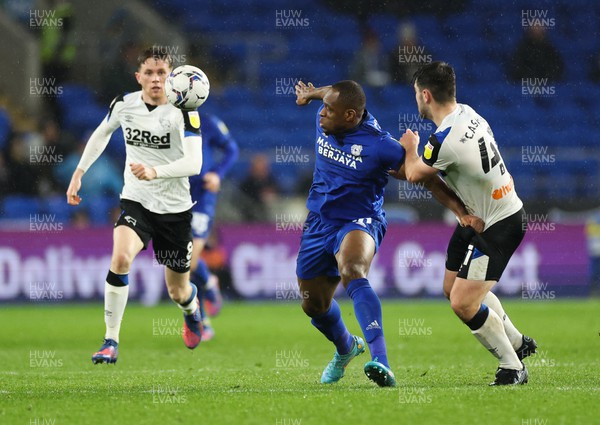 010322 - Cardiff City v Derby County, Sky Bet Championship - Uche Ikpeazu of Cardiff City and Eiran Cashin of Derby County compete for the ball