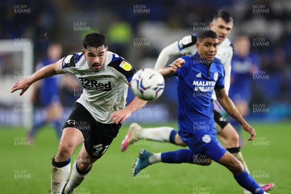 010322 - Cardiff City v Derby County, Sky Bet Championship - Eiran Cashin of Derby County and Cody Drameh of Cardiff City compete for the ball