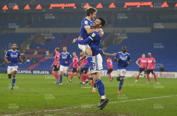 020321 - Cardiff City v Derby County, Sky Bet Championship - Kieffer Moore of Cardiff City celebrates with Will Vaulks of Cardiff City after he heads to score the second goal
