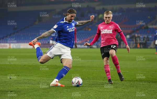 020321 - Cardiff City v Derby County, Sky Bet Championship - Aden Flint of Cardiff City takes on Louie Sibley of Derby County
