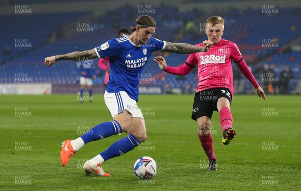 020321 - Cardiff City v Derby County, Sky Bet Championship - Aden Flint of Cardiff City takes on Louie Sibley of Derby County