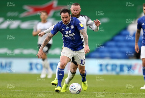 140720 - Cardiff City v Derby County - SkyBet Championship - Lee Tomlin of Cardiff City is challenged by Wayne Rooney of Derby County