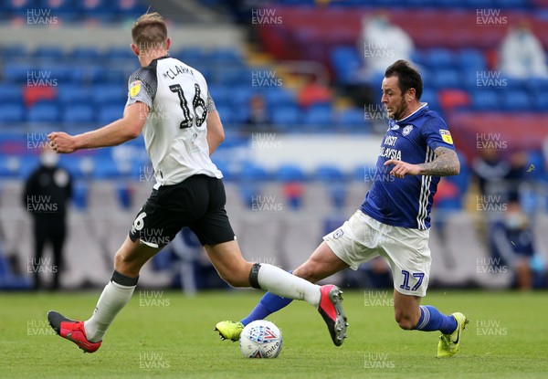 140720 - Cardiff City v Derby County - SkyBet Championship - Lee Tomlin of Cardiff City is challenged by Matthew Clarke of Derby County