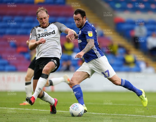 140720 - Cardiff City v Derby County - SkyBet Championship - Lee Tomlin of Cardiff City is tackled by Matthew Clarke of Derby County